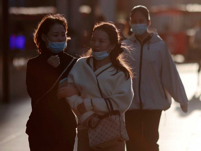 China reporta alza de contagios de COVID
